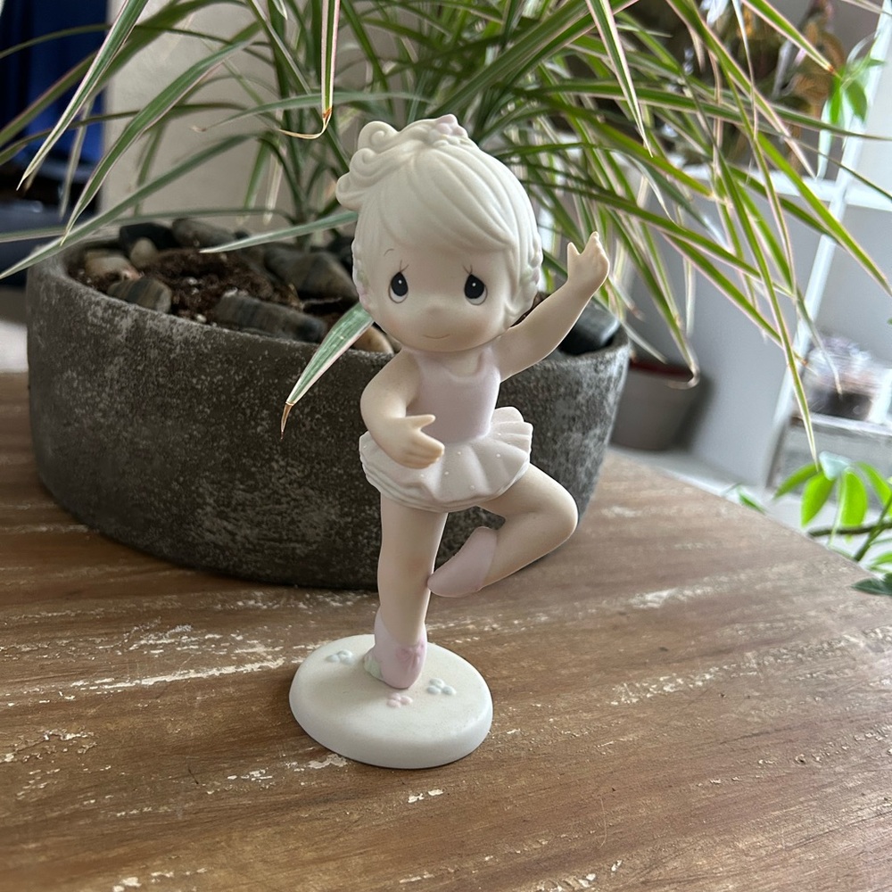 Precious Moments Retired “In the Spotlight of His Grace” porcelain figurine.